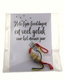 Kerstkaart met gelukspoppetje