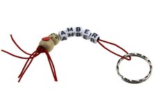 Gelukspoppetjes sleutelhanger poppetje met hartje op buik met naam